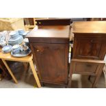 An Edwardian mahogany and inlaid music cabinet