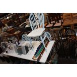 A painted oak refectory type table with four simil