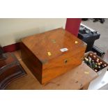 A Victorian walnut and brass mounted writing box