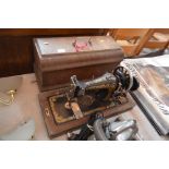 A Frister & Rossman hand sewing machine