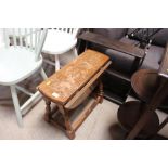 An oak drop leaf table and a wall shelf