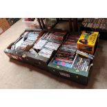 Three boxes of DVDs