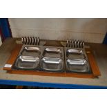 Two Old Hall stainless steel toast racks and a dis