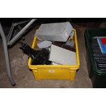 A box containing slide boxes, car jack, various ha