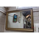 A gilt framed and bevel edged wall mirror