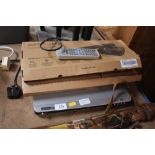 An acoustic Solutions DVD players with remote cont