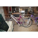 A girl's Falcon Orchid mountain bike with front su