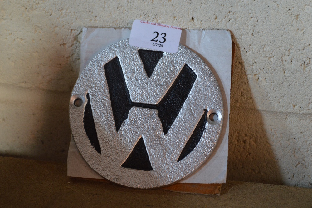 A reproduction cast iron Volkswagen sign