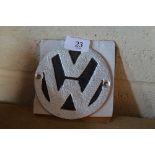 A reproduction cast iron Volkswagen sign