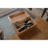 A wooden box and contents of cheroot holders