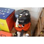 A Henry vacuum cleaner, 110v lacking attachments