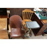 An early 20th Century oak fireside chair, a pine s