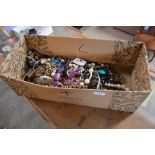 A large box of costume jewellery