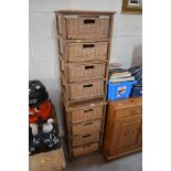 Two wooden and wicker four drawer chests