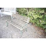 A cast iron and wooden garden bench, AF