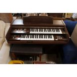 An electric organ and stool