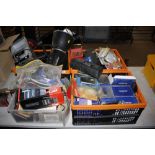 Four boxes of various camera accessories, lenses,