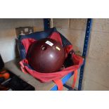 A ten pine bowling ball and carrying bag