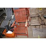 Four wooden folding garden chairs