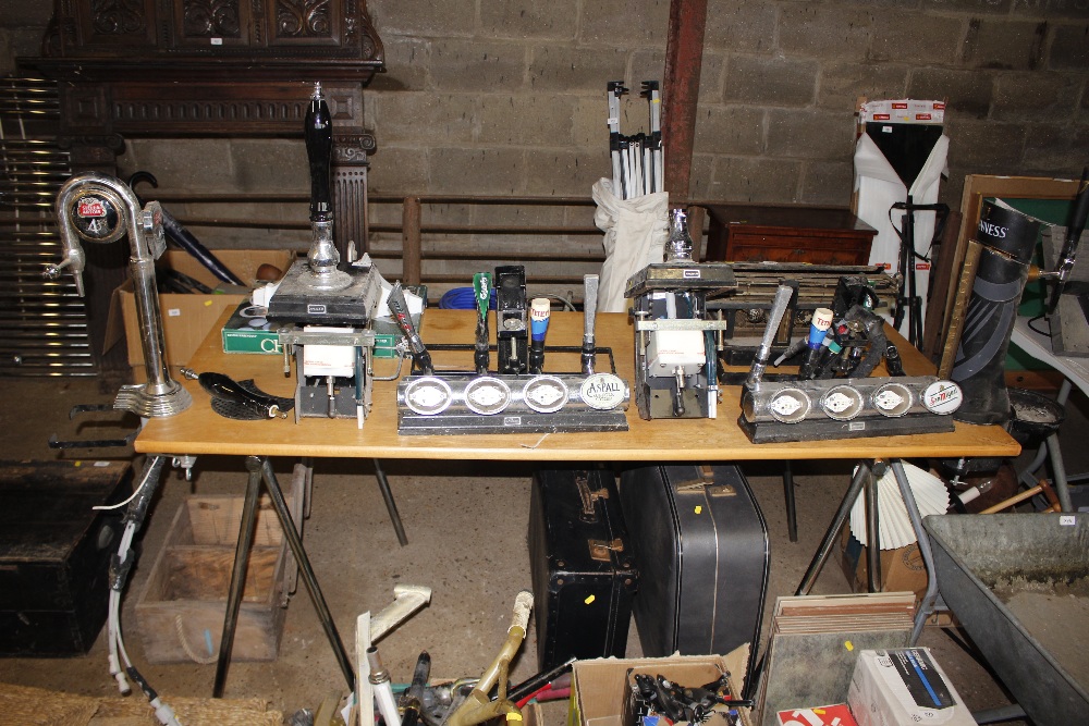 A collection of beer pumps etc.