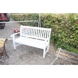 A painted wooden garden bench