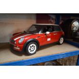 A radio controlled model of a Mini Cooper, lacking