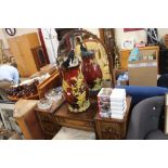 A carved oak dressing table; and dressing table st