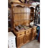 A stripped pine dresser