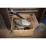 A box containing steering wheel, various sundries,