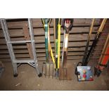 A quantity of long handled garden tools to include