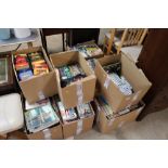 Eleven boxes of various books, CDs and DVDs