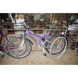 A girl's Excel Vegas mountain bike with dual suspe