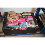 A box of books and Ordnance Survey maps