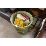 A linen basket and contents of books