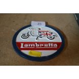 A reproduction cast iron Lambretta advertising sign