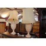 A pair of table lamps and shades