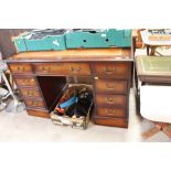 A reproduction mahogany twin pedestal writing desk