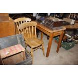 A stripped pine and oak table fitted single drawer