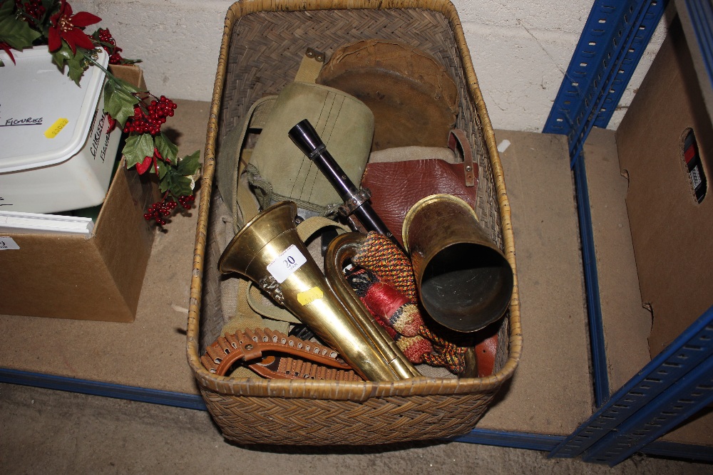 A quantity of military items including a brass bug