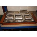 Two Old Hall stainless steel toast racks and a dis
