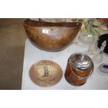 A rustic wooden bowl; together with a biscuit barr