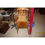 An elm seater Windsor chair