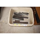 A tub of various spanners