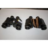 Two pairs of military binoculars