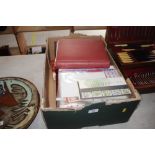 A box of stamps and albums