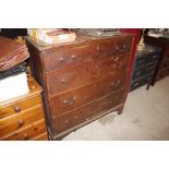 An 19th Century oak chest fitted four long drawers