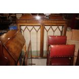 A mahogany bow front display cabinet