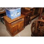 A small pine cupboard; together with a bedside cup