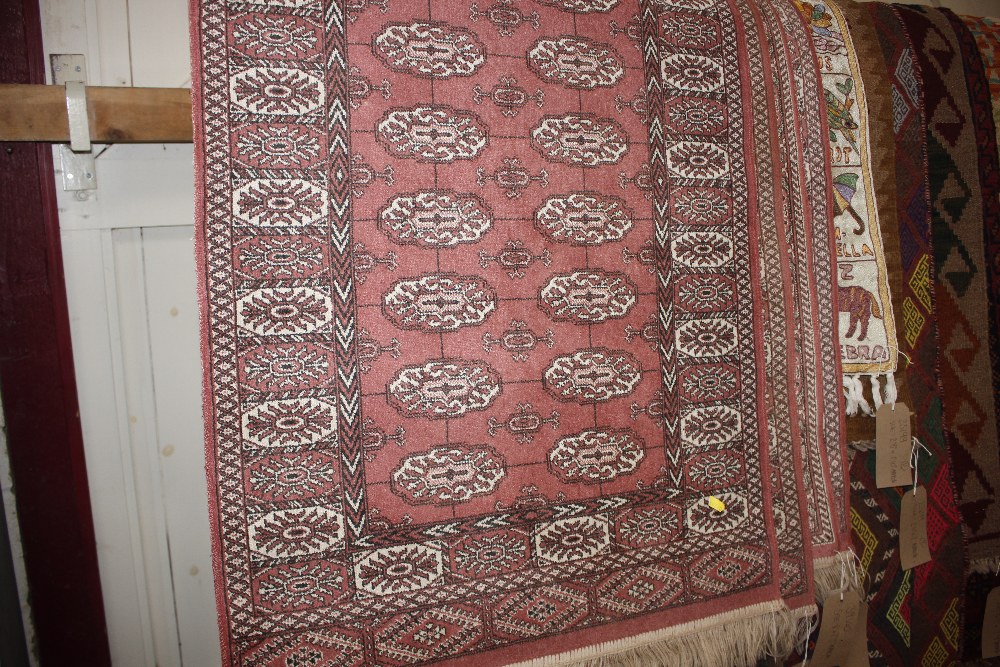 Four Persian style rugs measuring 4" x 2'3"