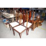 A set of four Queen Anne style dining chairs